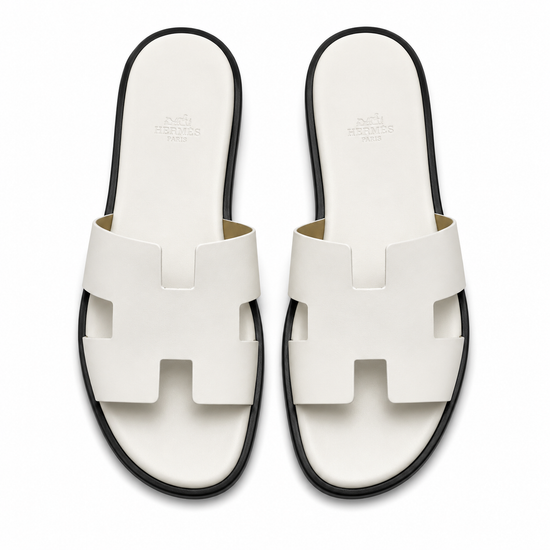HER WHITE SANDALES