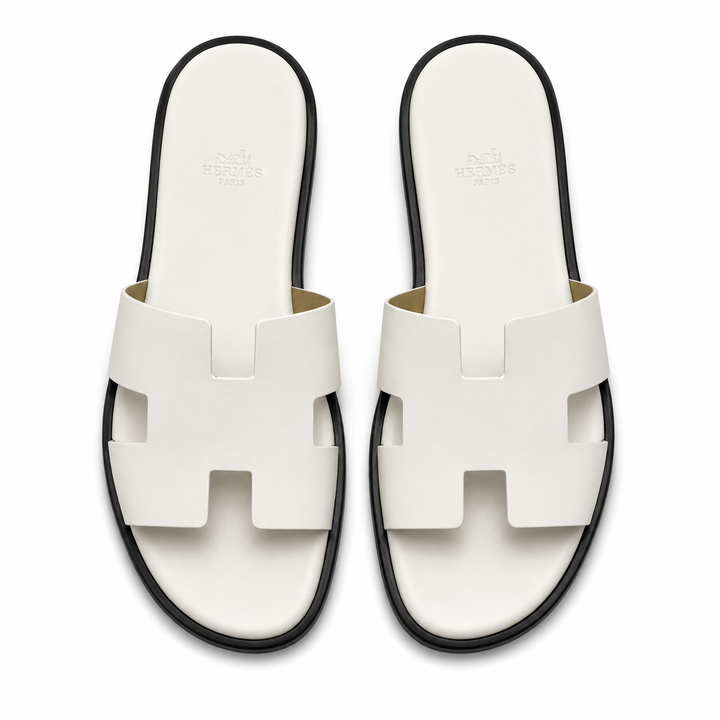 HER WHITE SANDALES